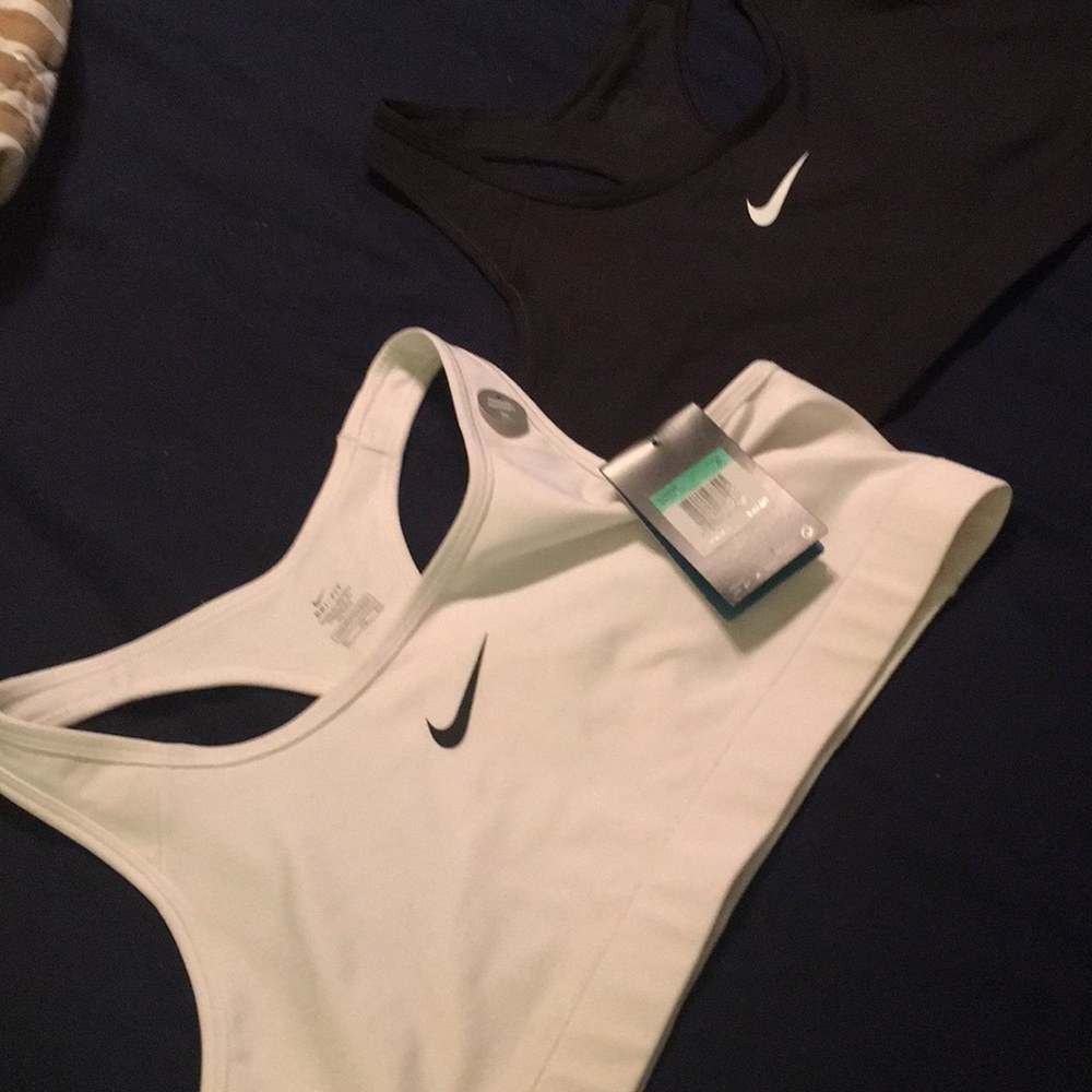 Two Nike sports bras. Never been worn!